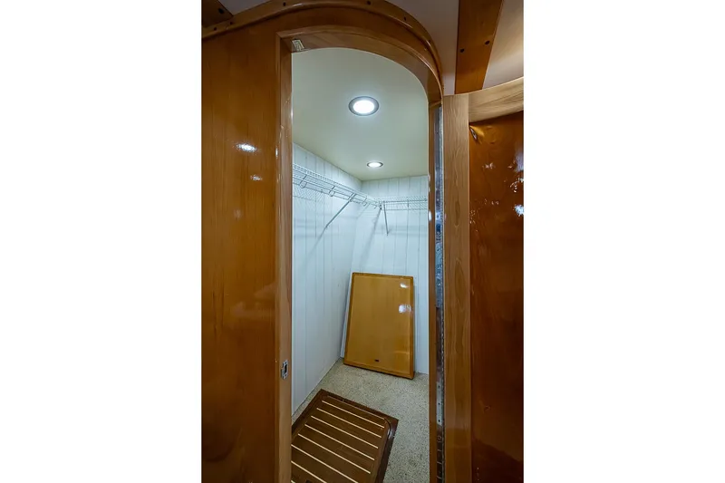 Slide: The Image of Spacious wooden interior of 2003 Magna Marine Nova Scotia 47 yacht closet. - 24