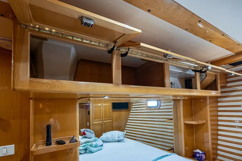 Slide: The Image of Luxurious wooden interior of 2003 Magna Marine Nova Scotia 47 yacht cabin. - 25