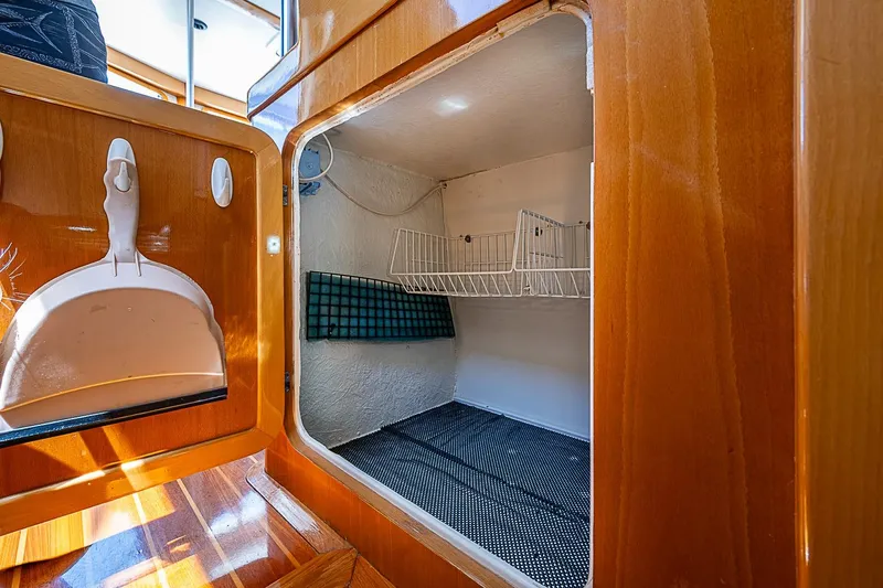Slide: The Image of Interior storage compartment of 2003 Magna Marine Nova Scotia 47 boat. - 44