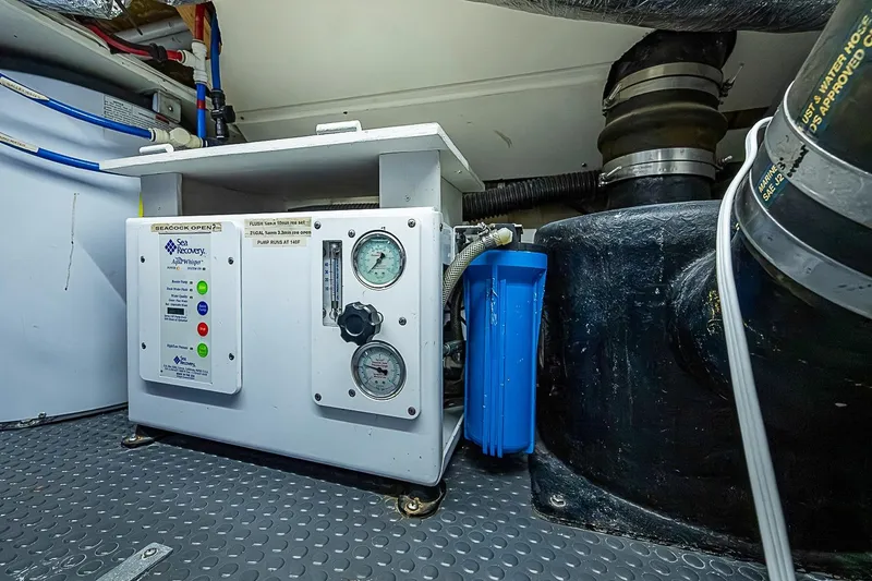 Slide: The Image of Marine engine room of 2003 Magna Marine Nova Scotia 47, featuring Sea Recovery system. - 59