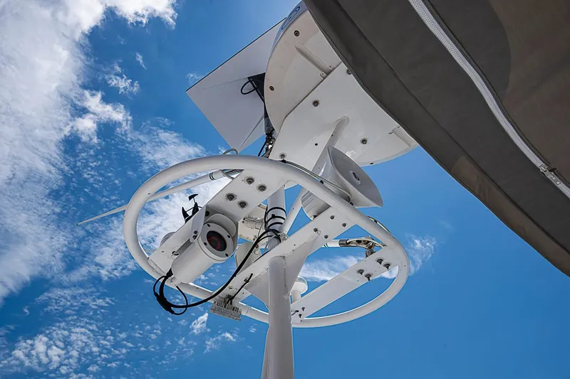 Slide: The Image of Radar and camera equipment on Magna Marine Nova Scotia 47, 2003, against a clear blue sky. - 69