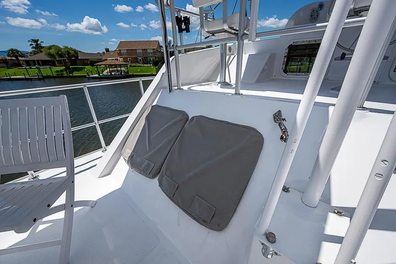 Slide: The Image of Deck view of 2003 Magna Marine Nova Scotia 47 yacht, featuring seating and railing. - 70