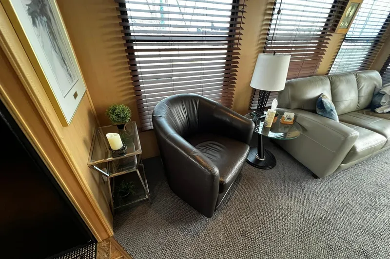 Slide: The Image of Luxurious interior of 2010 Skipperliner 480 Flybridge with leather seating and elegant decor. - 24
