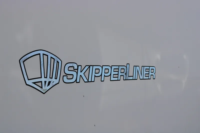 Slide: The Image of Skipperliner 480 Flybridge 2010 logo on a white background. - 5