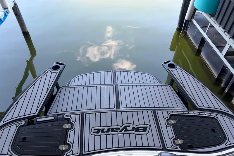 Slide: The Image of Rear view of a 2013 Bryant 210 Walkabout boat with custom decking. - 11