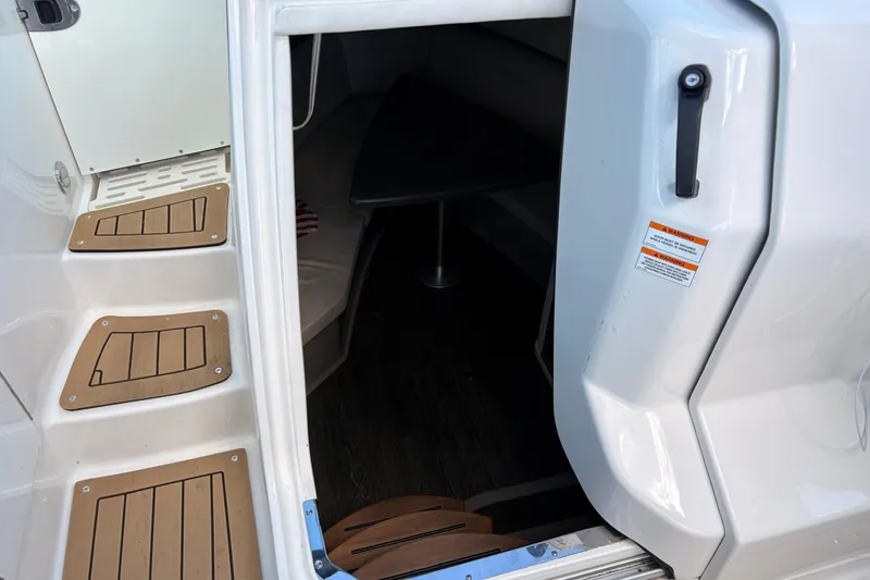 Slide: The Image of Entrance to cabin of 2019 Sea Ray Sundancer 320 with wooden steps. - 11
