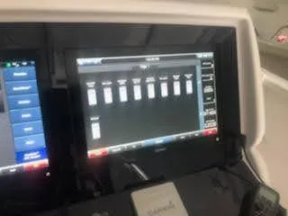 Slide: The Image of Dashboard of a 2019 Midnight Express 39 Cuddy boat with electronic display. - 8