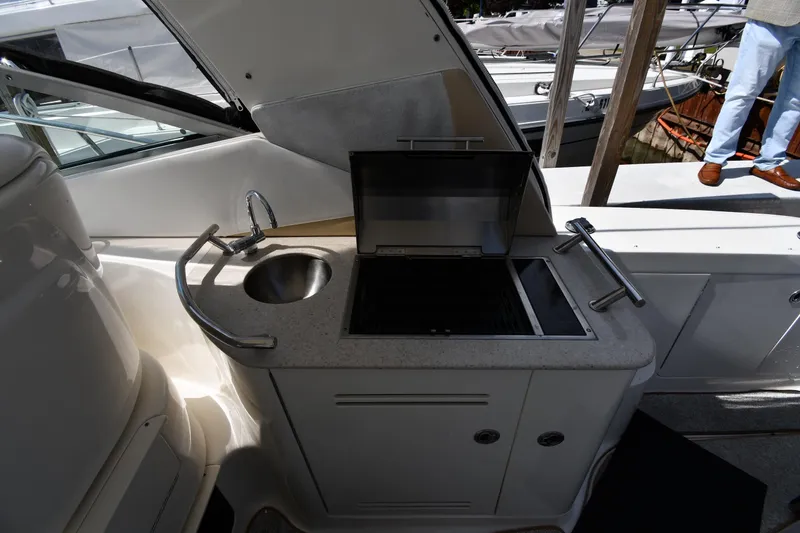 Slide: The Image of Outdoor kitchenette on a 2008 Sea Ray Sundancer 350 yacht with sink and grill. - 22