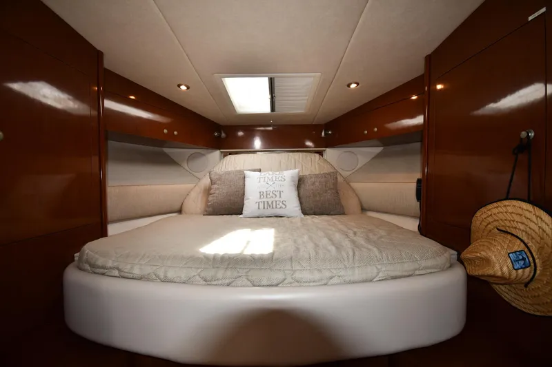 Slide: The Image of Luxurious cabin interior of 2008 Sea Ray Sundancer 350 yacht with cozy bedding. - 28