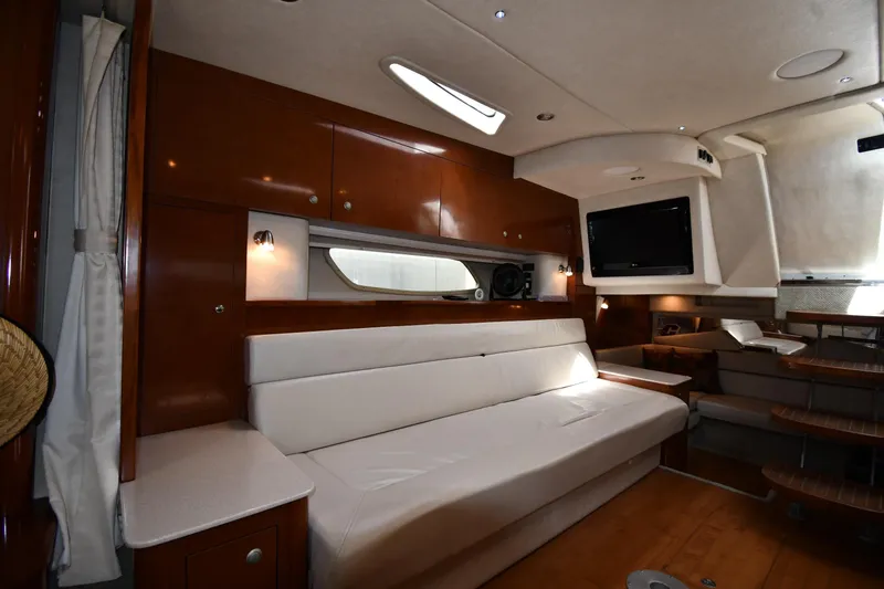 Slide: The Image of Luxurious interior of 2008 Sea Ray Sundancer 350 yacht with plush seating and modern amenities. - 34