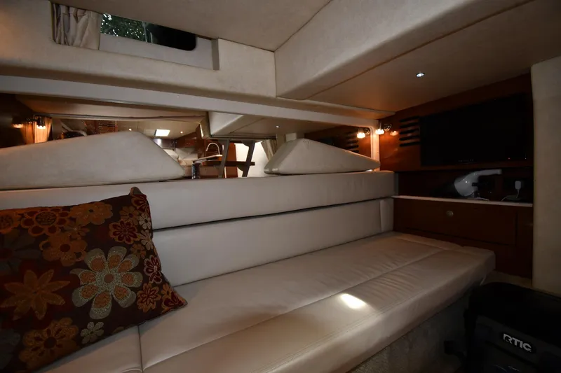 Slide: The Image of Luxurious interior of 2008 Sea Ray Sundancer 350 yacht with plush seating and elegant decor. - 44
