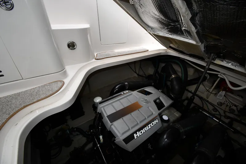 Slide: The Image of Engine compartment of 2008 Sea Ray Sundancer 350 with Horizon engine visible. - 49