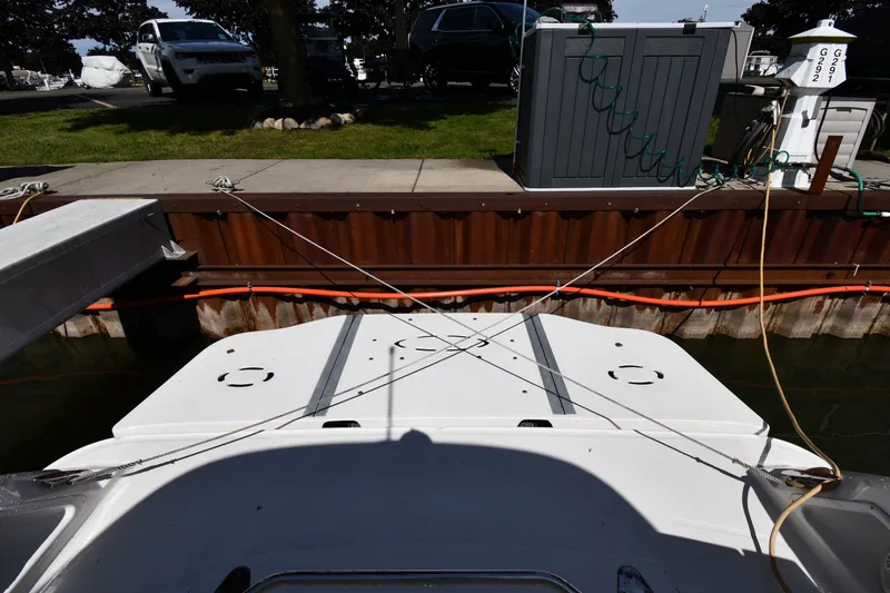 Slide: The Image of 2008 Sea Ray Sundancer 350 docked at marina with utility connections. - 8