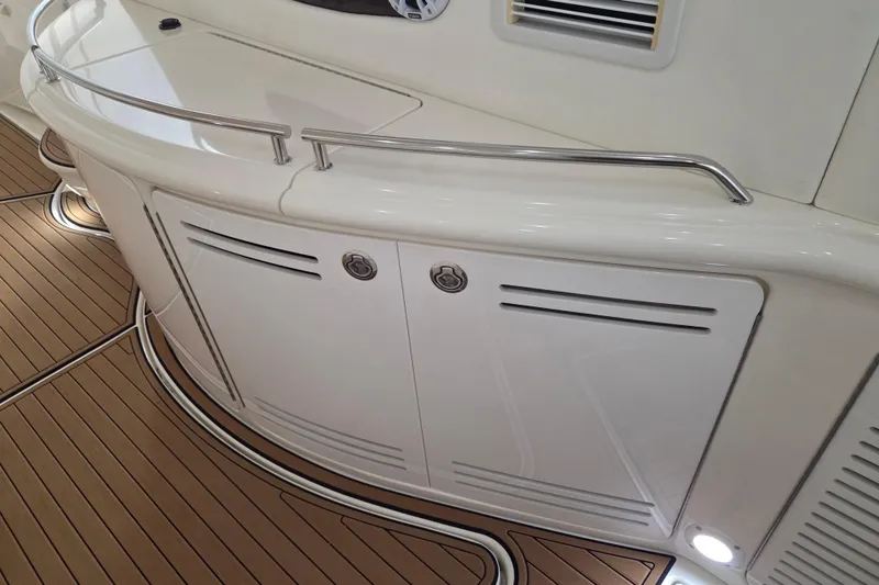 Slide: The Image of Interior view of a 2000 Sea Ray Sundancer 540 yacht with sleek design and wood flooring. - 15