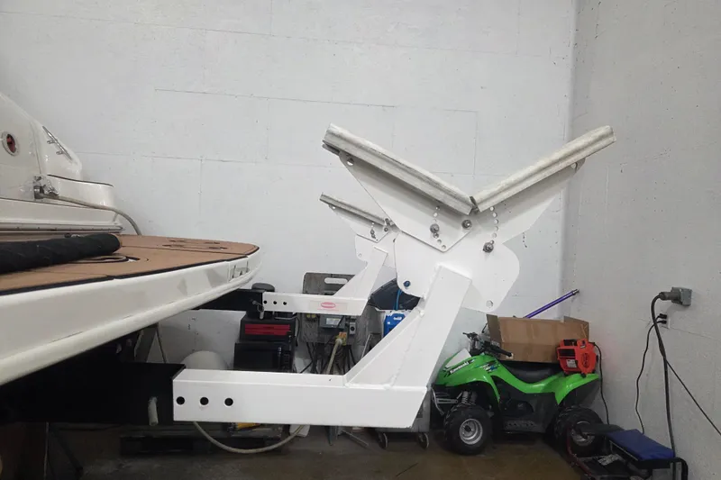 Slide: The Image of 2000 Sea Ray Sundancer 540 boat in garage with custom lift mechanism. - 17