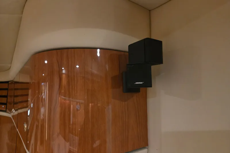 Slide: The Image of Bose speakers mounted on wood panel inside 2000 Sea Ray Sundancer 540 yacht. - 25