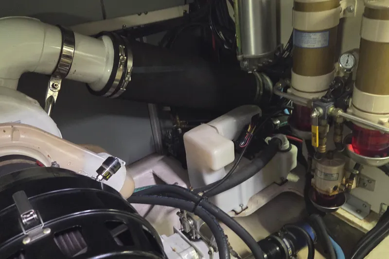 Slide: The Image of Engine room of a 2000 Sea Ray Sundancer 540 yacht, showcasing mechanical components. - 49