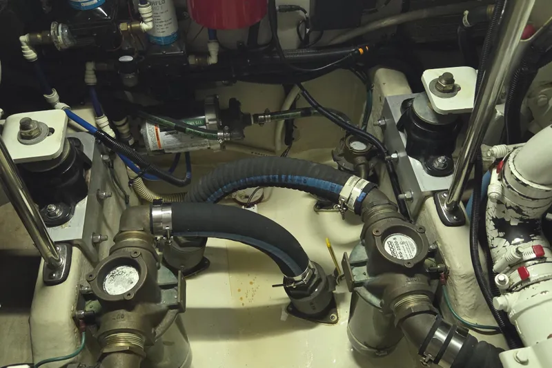 Slide: The Image of Engine room of a 2000 Sea Ray Sundancer 540 with visible mechanical components. - 50