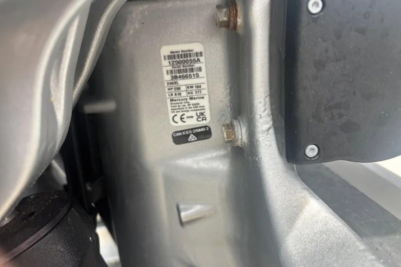 Slide: The Image of Close-up of a 2024 Sea Ray SDX 290 Outboard engine label with specifications. - 15