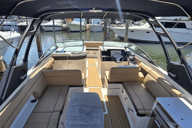 Slide: The Image of 2024 Sea Ray SDX 290 Outboard boat interior with luxurious seating and modern design. - 3