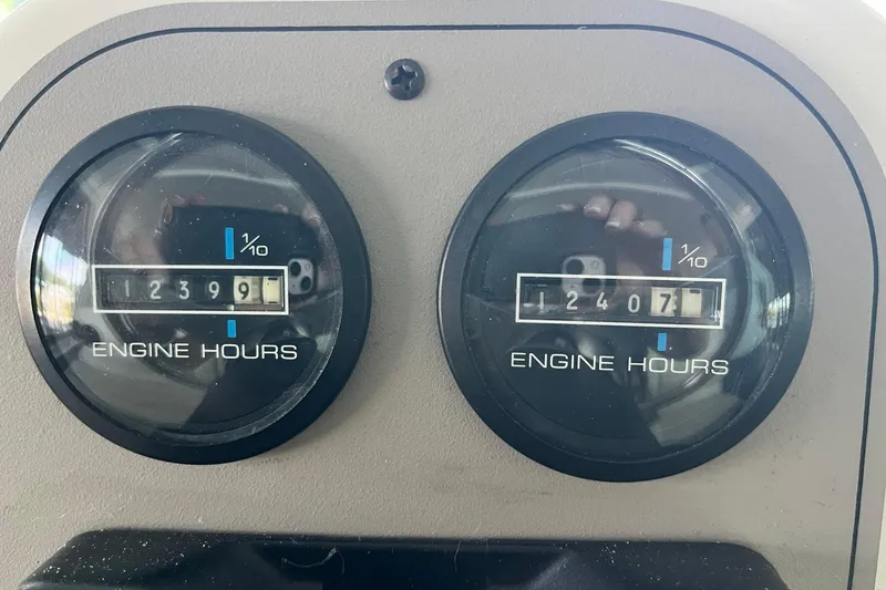 Slide: The Image of Engine hour meters on a 1997 Carver 500 Cockpit Motor Yacht dashboard. - 15