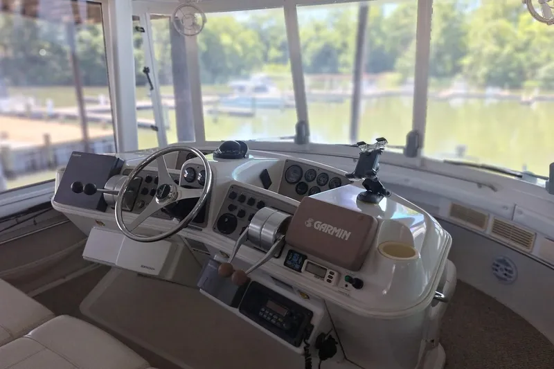 Slide: The Image of Cockpit of 1997 Carver 500 Cockpit Motor Yacht with Garmin navigation system. - 26