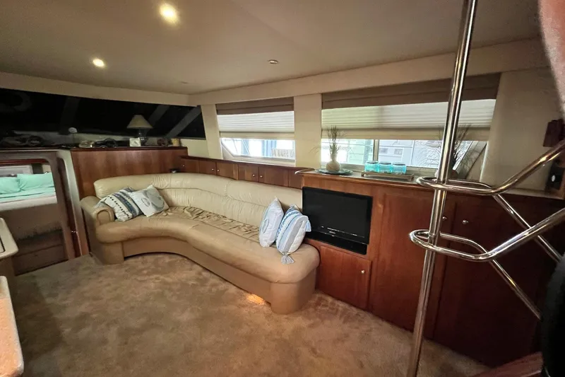 Slide: The Image of Luxurious interior of 1997 Carver 500 Cockpit Motor Yacht with plush seating and elegant decor. - 30