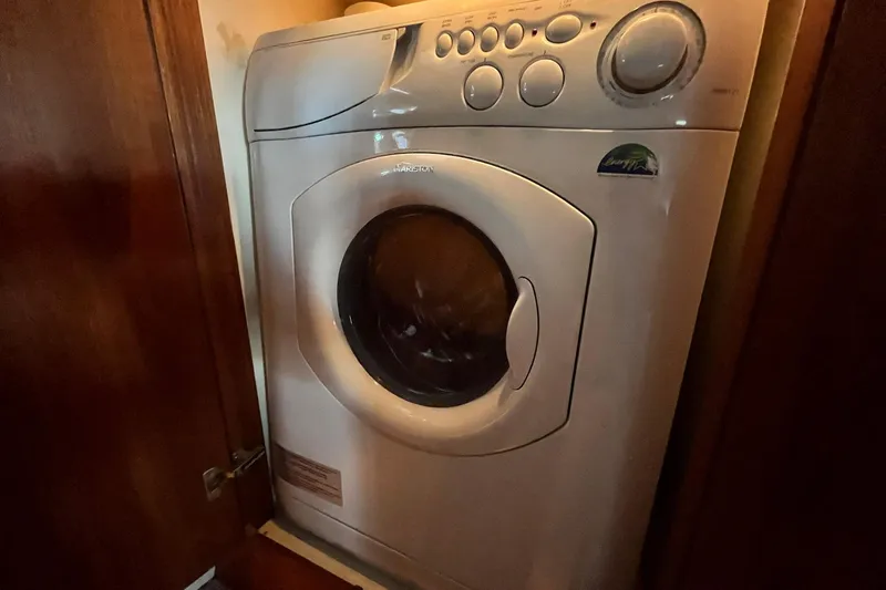 Slide: The Image of Washing machine inside a 1997 Carver 500 Cockpit Motor Yacht cabin. - 48