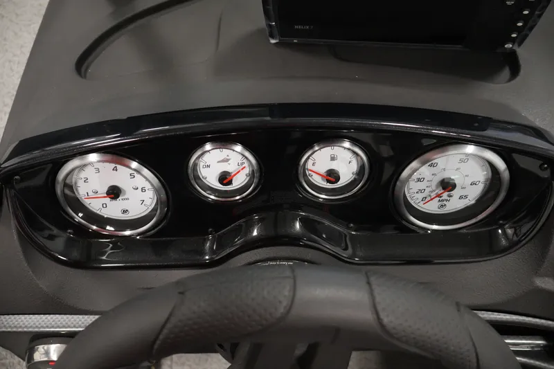 Slide: The Image of Dashboard of 2026 Crestliner 1650 Hawk WT boat with gauges and steering wheel. - 32