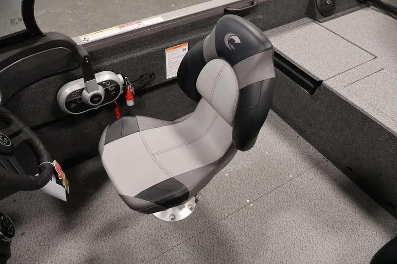 Slide: The Image of Captain's seat in 2026 Crestliner 1650 Hawk WT boat, featuring modern design and controls. - 36