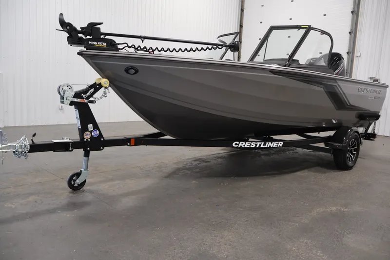 Slide: The Image of 2026 Crestliner 1650 Hawk WT boat on trailer in indoor setting. - 49