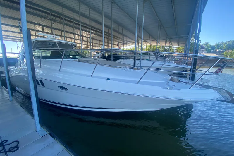 Slide: The Image of 2007 Sea Ray 40 Sundancer yacht docked in a covered marina. - 1