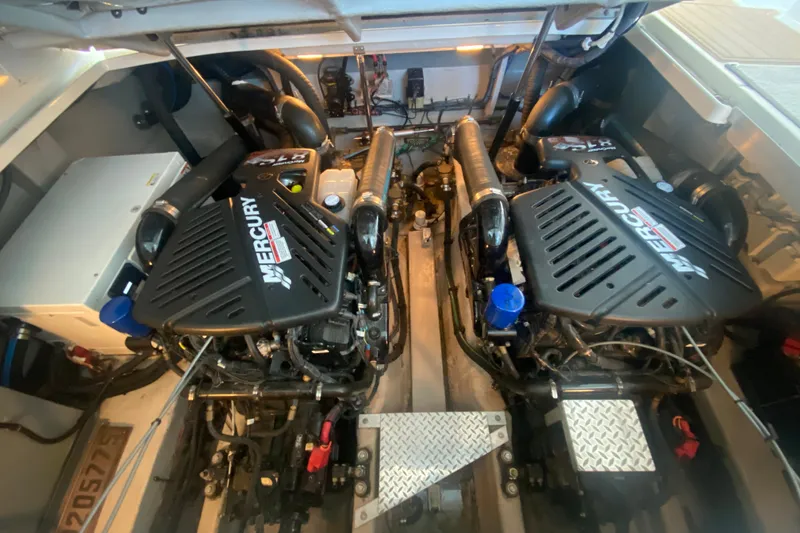 Slide: The Image of Engine room of a 2007 Sea Ray 40 Sundancer with twin Mercury engines. - 25