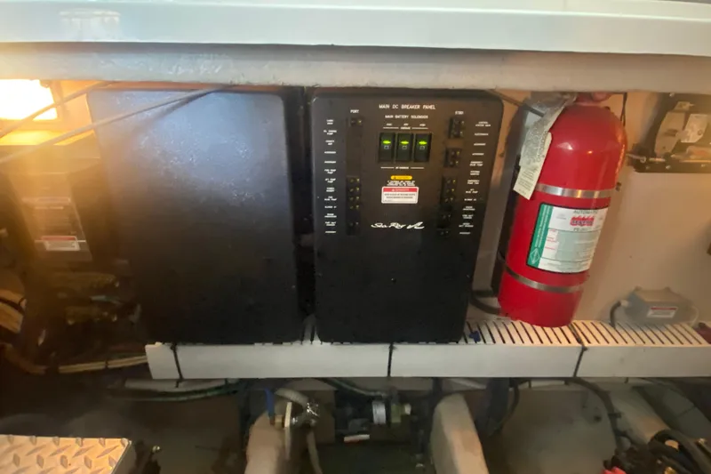Slide: The Image of Electrical panel and fire extinguisher in 2007 Sea Ray 40 Sundancer boat engine room. - 29