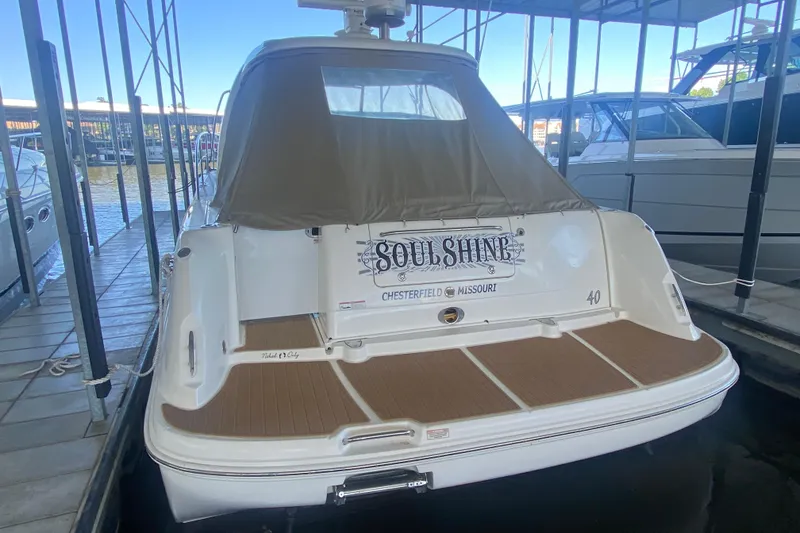 Slide: The Image of 2007 Sea Ray 40 Sundancer docked, rear view with "Soul Shine" nameplate. - 4