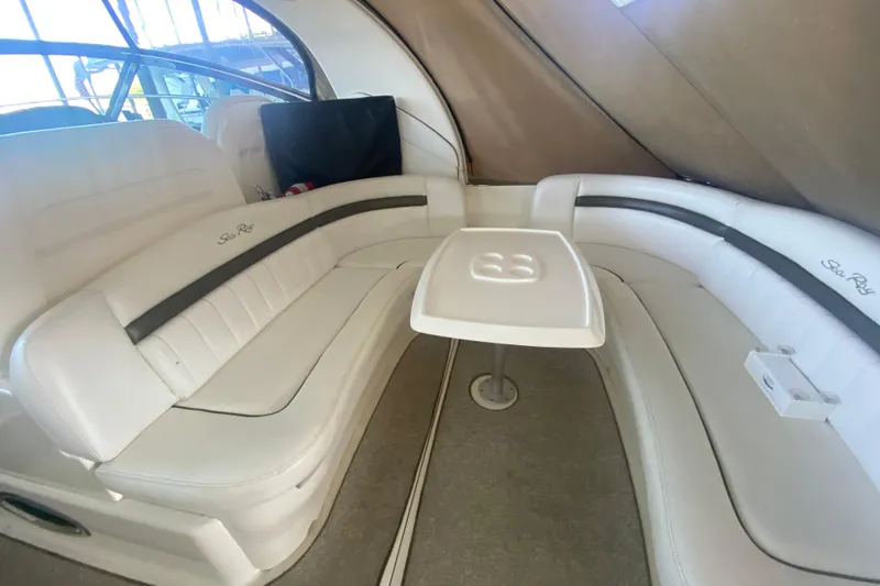 Slide: The Image of Luxurious interior seating of 2007 Sea Ray 40 Sundancer yacht with elegant white upholstery. - 7