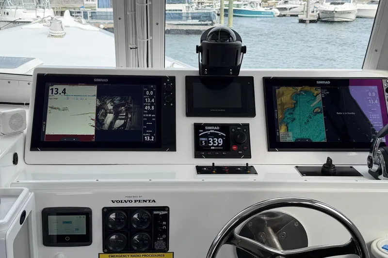 Slide: The Image of Helm of 2018 H&H Marine Osmond Beal boat with Simrad navigation displays. - 33
