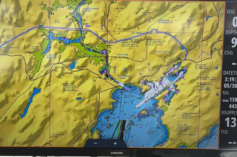 Slide: The Image of Marine navigation chart on a Samsung display, featuring Gloucester waterways and landmarks. - 36