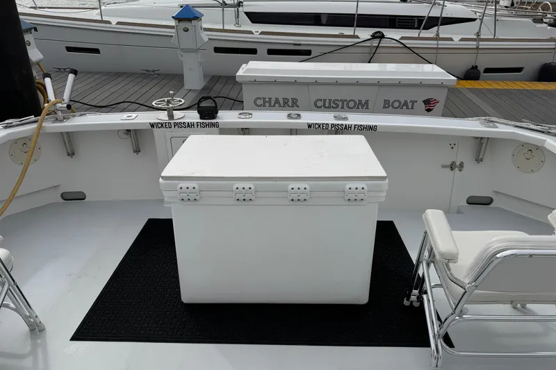 Slide: The Image of Fishing boat deck with cooler and chairs, H&H Marine Osmond Beal 2018 model. - 22