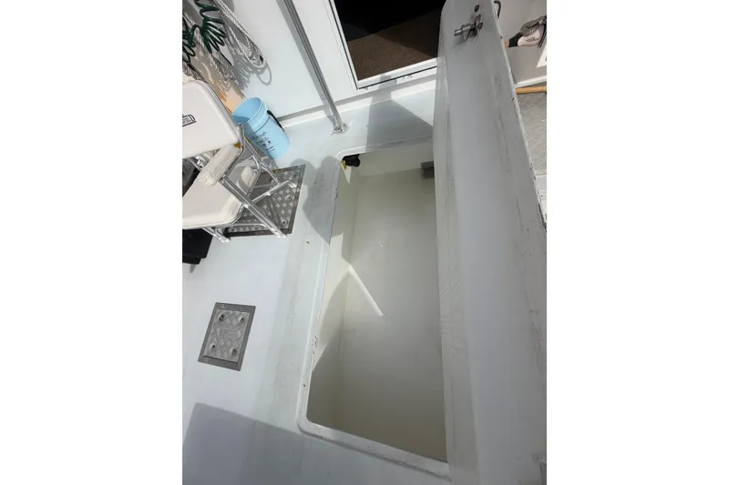 Slide: The Image of Open hatch on 2018 H&H Marine Osmond Beal boat deck, showing interior compartment. - 26