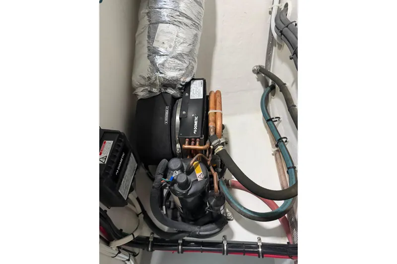 Slide: The Image of Engine compartment of 2018 H&H Marine Osmond Beal boat with Dometic components. - 80