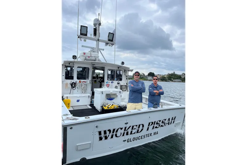 Slide: The Image of 2018 H&H Marine Osmond Beal boat "Wicked Pissah" with two people onboard, Gloucester, MA. - 18