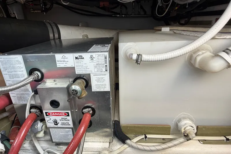 Slide: The Image of Engine room of 2018 H&H Marine Osmond Beal with electrical and plumbing components. - 86