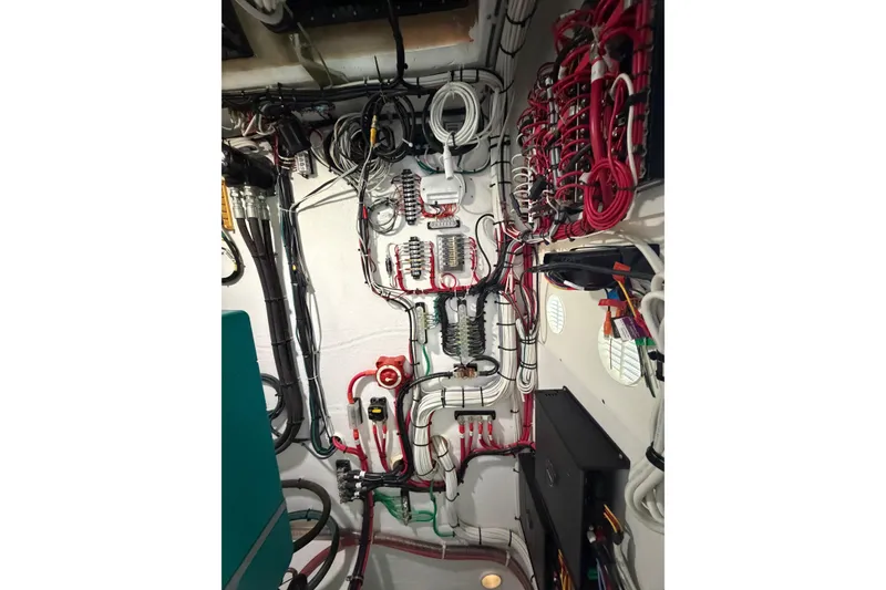 Slide: The Image of Electrical wiring system inside a 2018 H&H Marine Osmond Beal boat. - 56