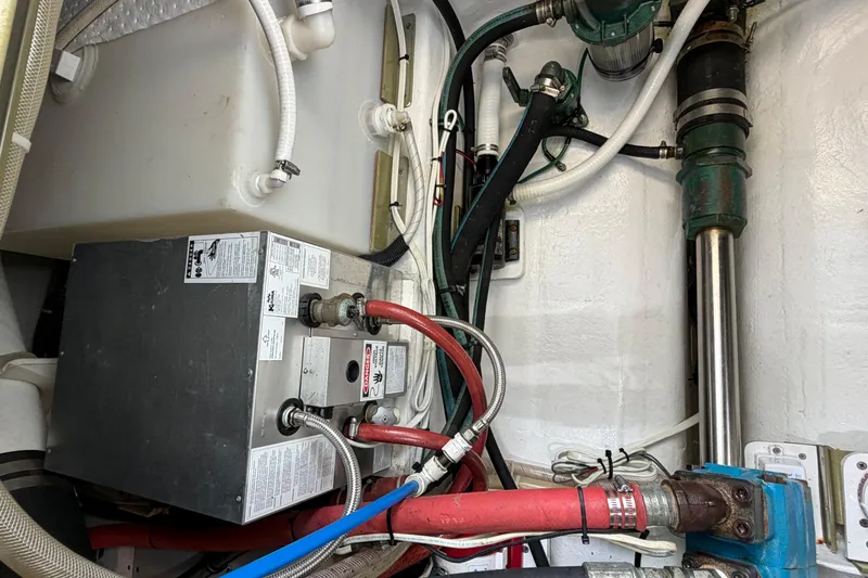 Slide: The Image of Engine room of 2018 H&H Marine Osmond Beal with various pipes and machinery. - 92