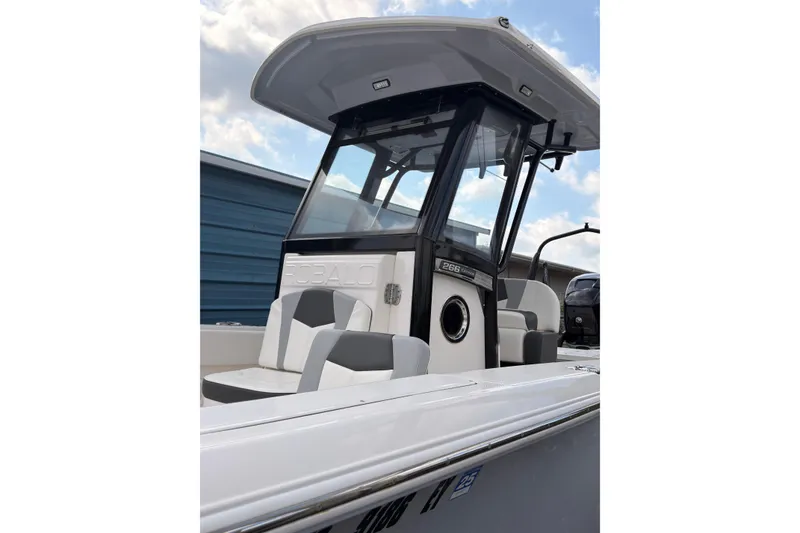 Slide: The Image of 2022 Robalo 266 Cayman boat with sleek design and modern seating. - 20