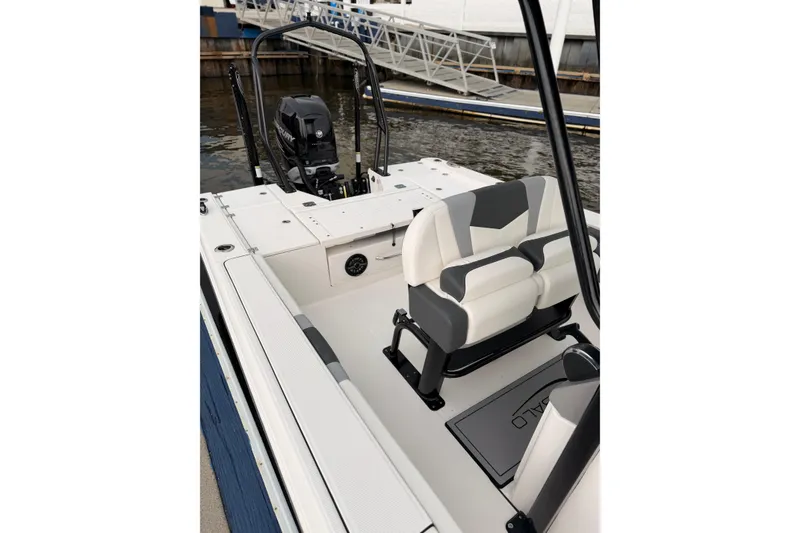 Slide: The Image of The image shows the cockpit of a 2022 Robalo 266 Cayman boat with modern seating. - 10