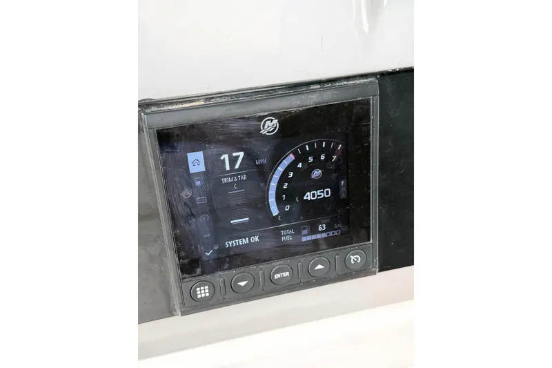 Slide: The Image of A digital display on a boat shows speed, RPM, and system status. - 36