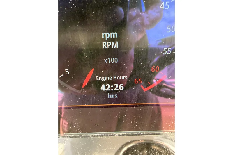 Slide: The Image of Close-up of a 2022 Robalo 266 Cayman engine hour meter showing 42:26 hours. - 39