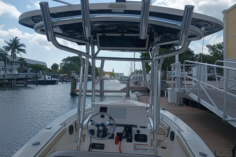 Slide: The Image of 2022 Sea Chaser 22 HFC boat docked at marina, view from helm. - 10